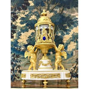 Rare Pendule en bronze doré à Cercles Tournants De Style Louis XVI. époque Napoléon III