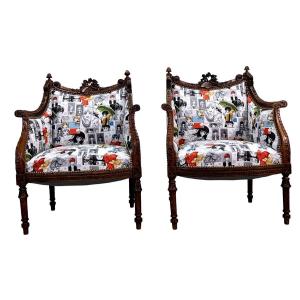 Pair Of Louis XVI Style Armchairs In Walnut, Carved With Decors Of Musical Instruments