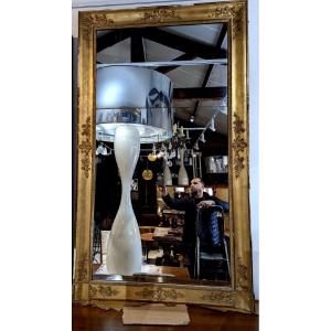 Large Restoration Mirror In Gilded Stucco With Gold Leaf 