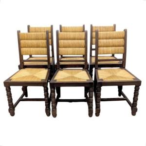 Série de 6 chaise en bois tourné et paillage par Charles Dudouyt