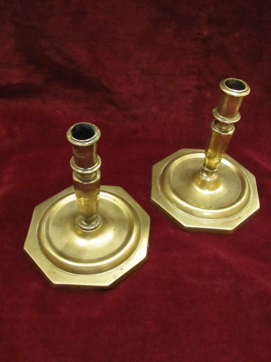 Pair Of 16th Century Bronze Candlesticks With Octagonal Base And Balustraded Body.