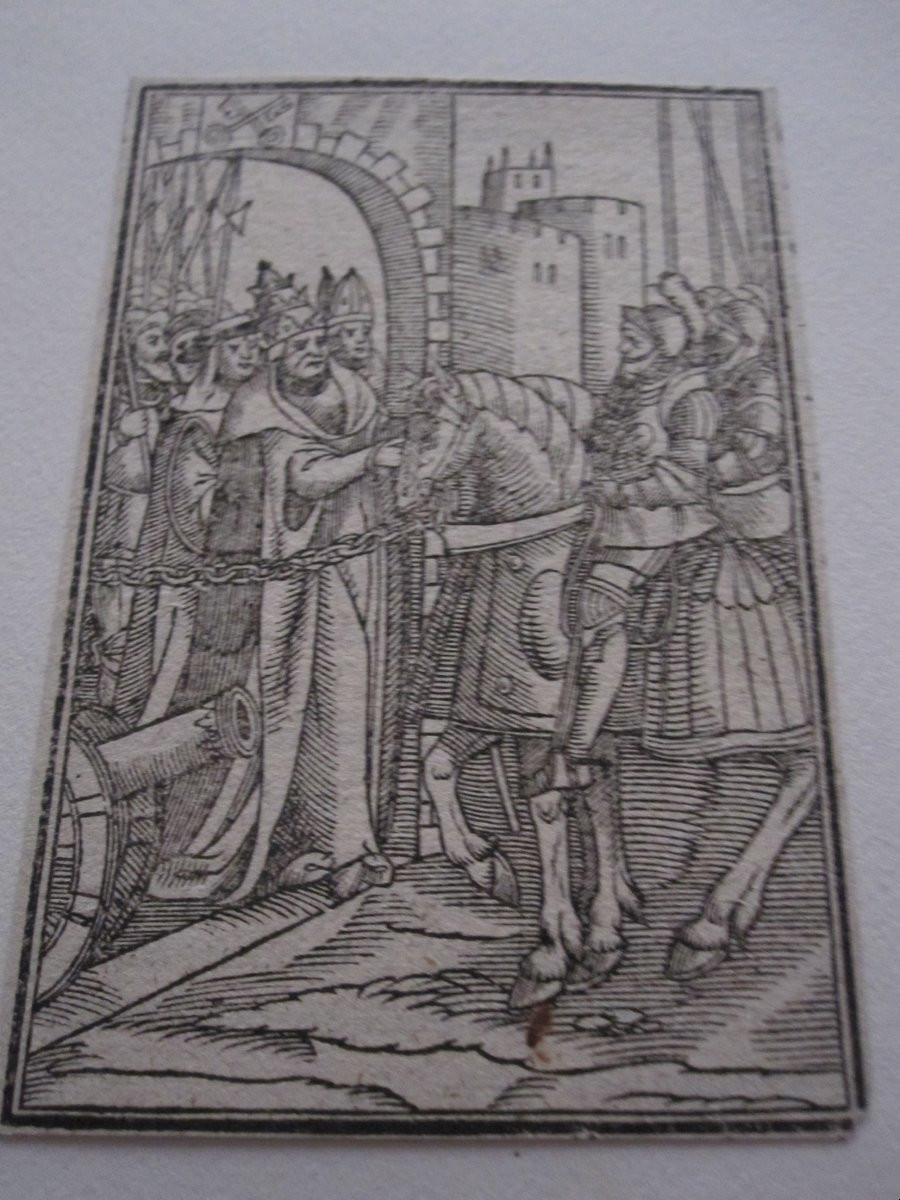 Petite gravure sur bois du XVIe siècle. Un chevalier reçu par le pape aux portes de la ville.-photo-1
