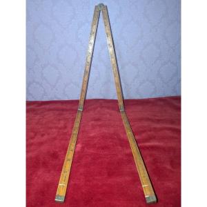 A 19th-century Spanish Measuring Rod, Marked In Feet And Centimeters.