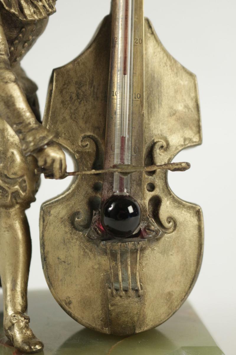In Barometer And Regulates Stand Stone Semi-precious Representative A Player From Cello.-photo-3