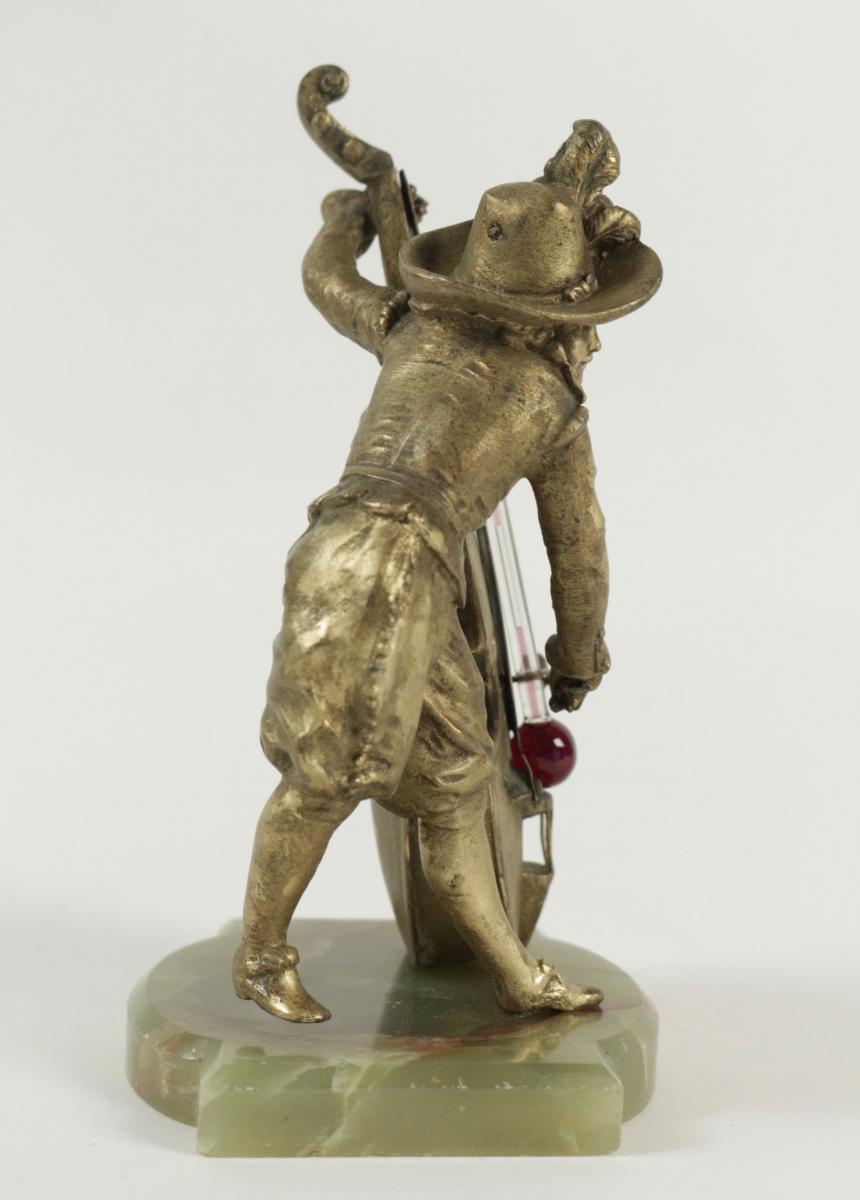 In Barometer And Regulates Stand Stone Semi-precious Representative A Player From Cello.-photo-4