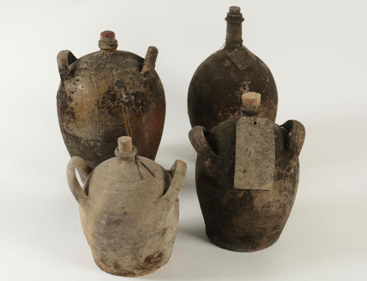 Collections Of Empty Ancient Bottles In Terra Cotta.