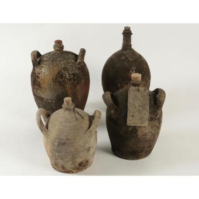 Collections Of Empty Ancient Bottles In Terra Cotta.