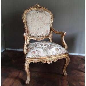 Paire de fauteuils dorés Venise Louis XV