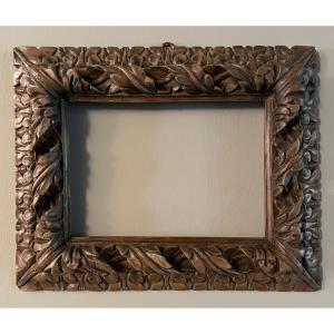 Walnut Frame, Carved And Engraved Wood.