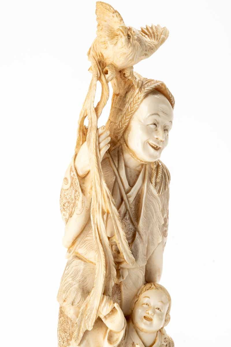 A Japanese Ivory Okimono Depicting A Hunter With An Onagadori Rooster-photo-4