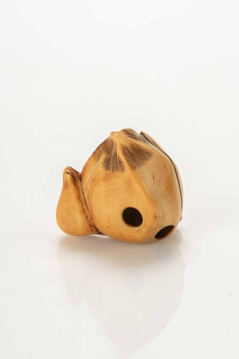 An Ivory Netsuke Depicting A Lotus Flower With The Buddhist Jewel-photo-3