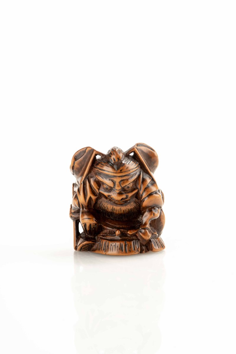 Netsuke en buis représentant Shoki avec un oni-photo-5