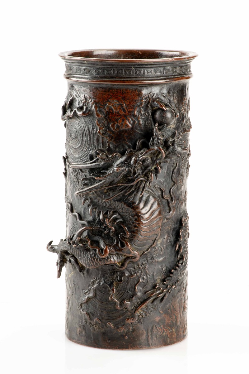 A Bronze Vase Depicting A Ryū Dragon In Relief Among Swirling Waves