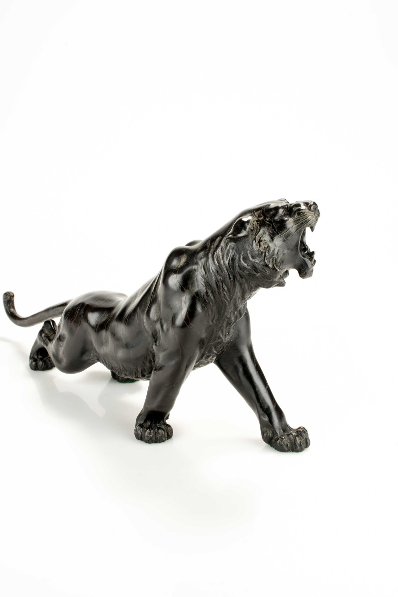 A Patinated Bronze Okimono Of A Roaring Tiger, Signed Maruki Company And Atsuyoshi