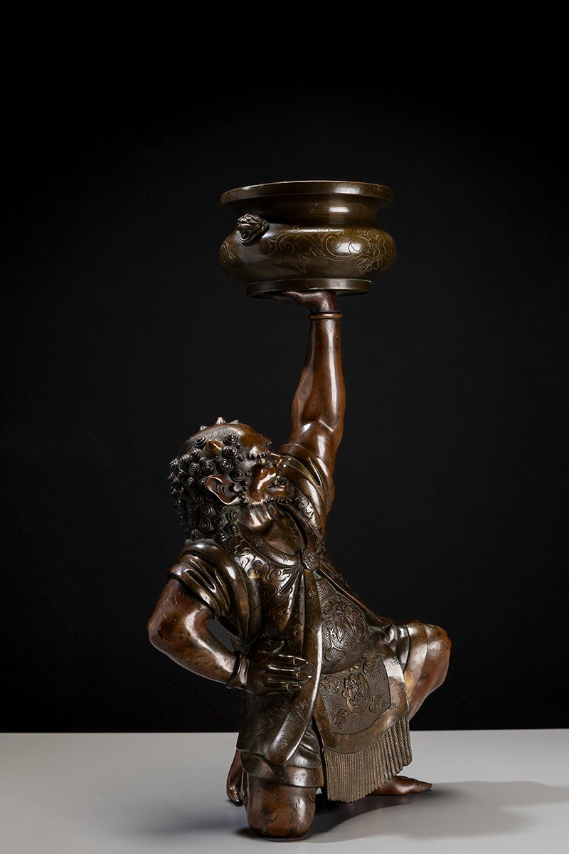 A Japanese Bronze Sculpture Depicting An Oni With A Ceremonial Koro-photo-1