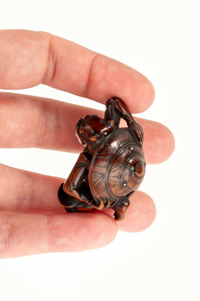 A Boxwood Netsuke Depicting An Oni And The Setsubun Festival-photo-1