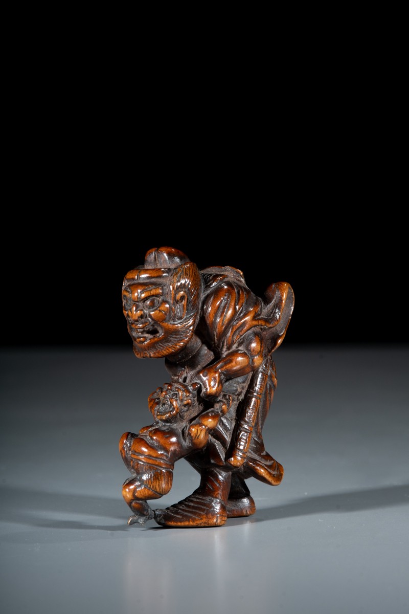 A Boxwood Netsuke Depicting Shōki With An Oni