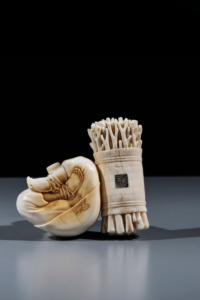 An Ivory Okimono Depicting A Woodcutter-photo-1