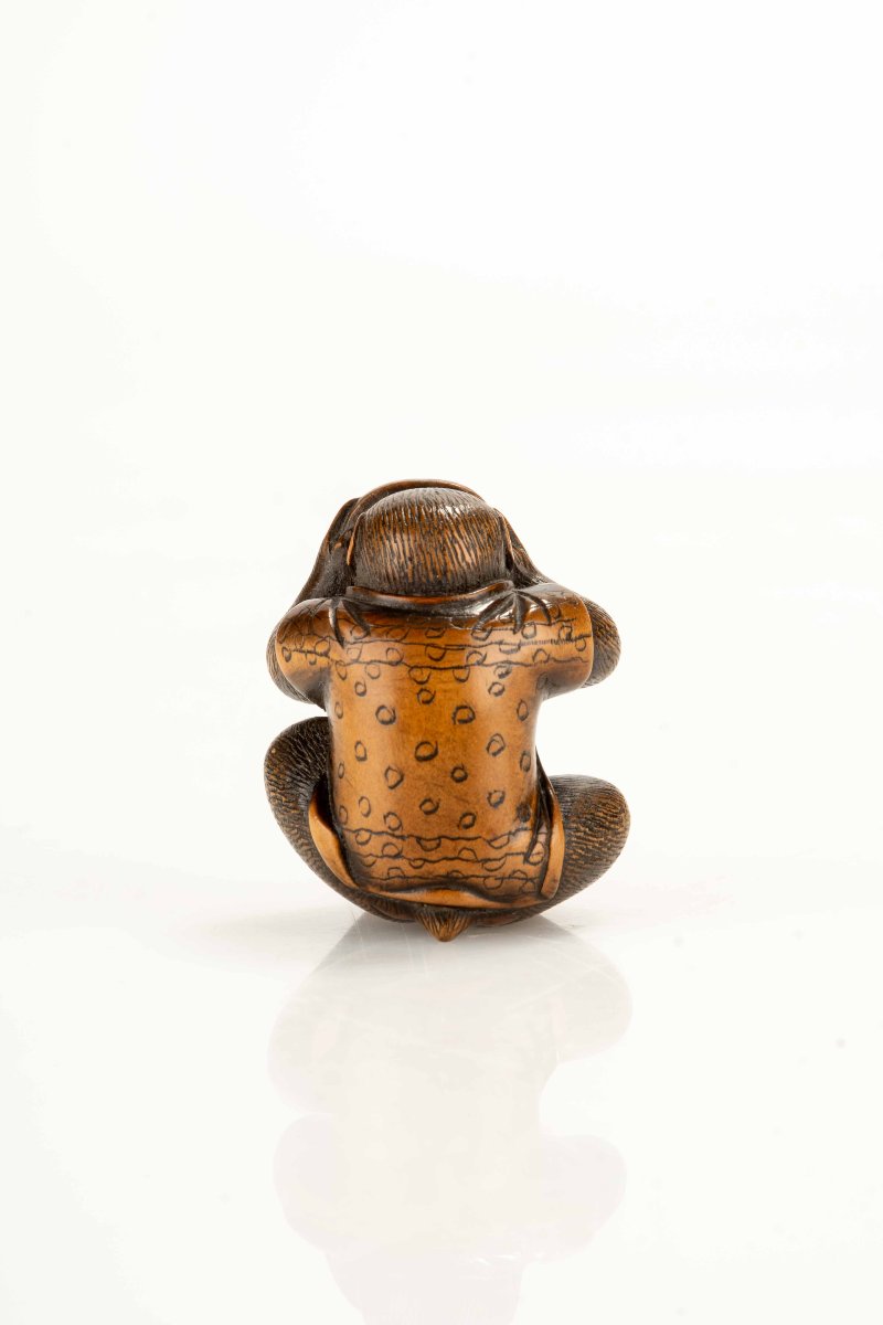 A Boxwood Netsuke Depicting A Monkey With An Okame Mask-photo-3