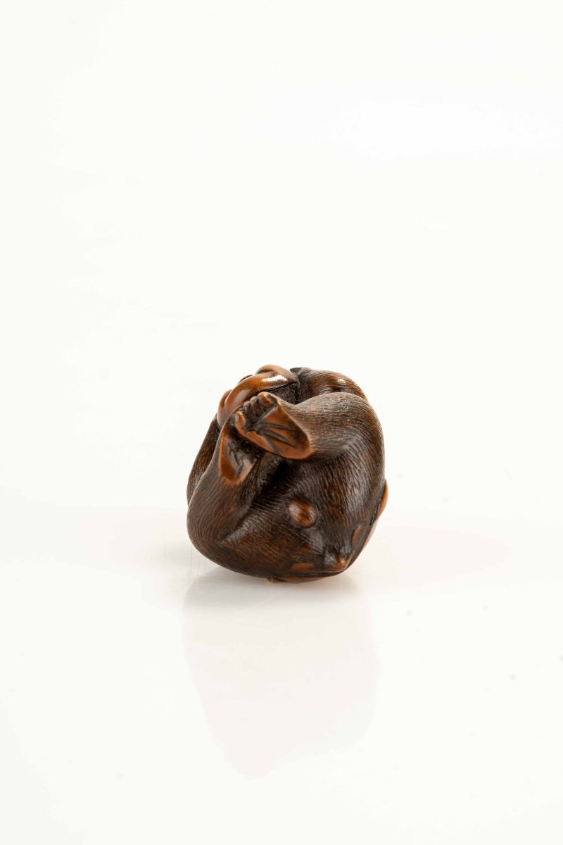 A Boxwood Netsuke Depicting A Monkey With An Okame Mask-photo-3