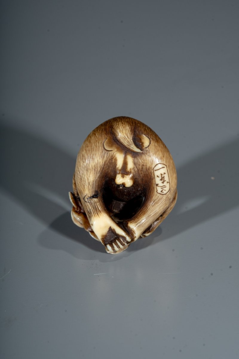 A Japanese Ivory Netsuke Of A Monkey With Fruit-photo-1