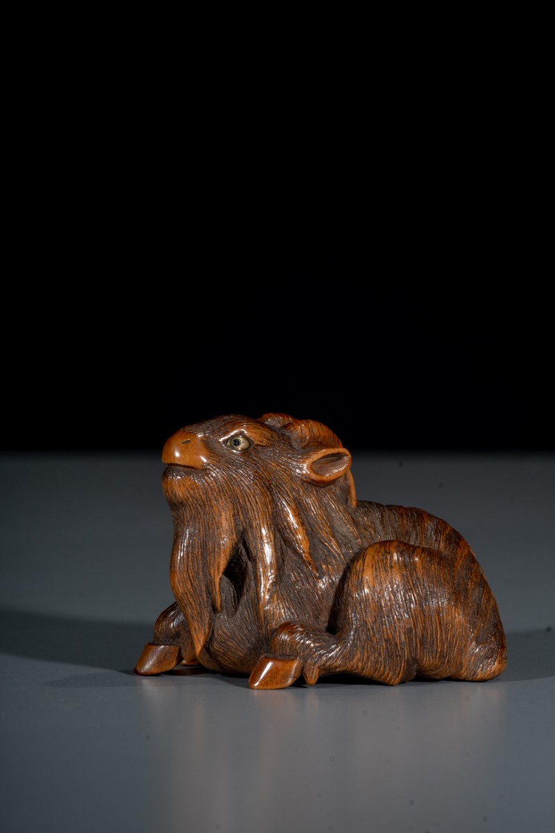 A Boxwood Netsuke Of A Goat, Signed Masanao
