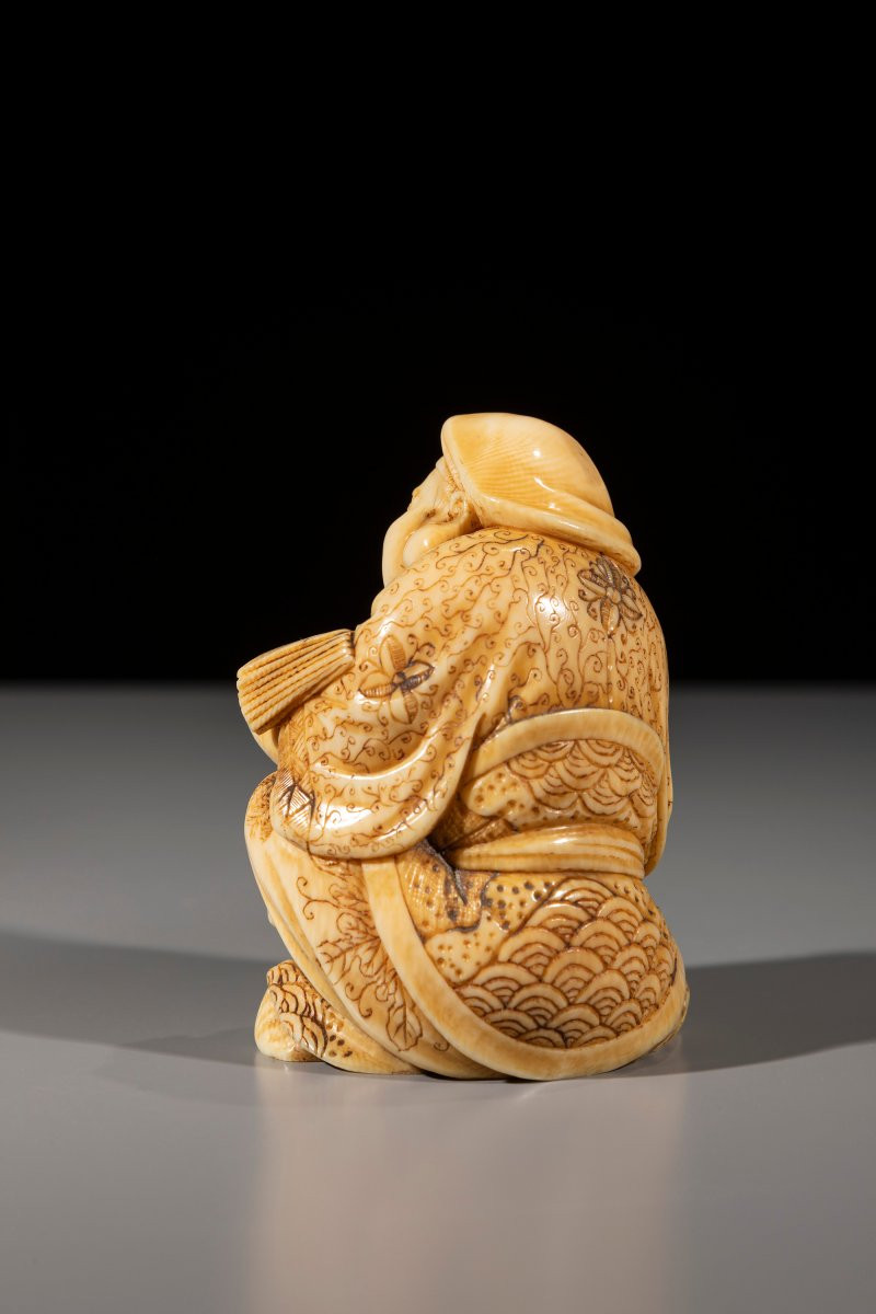An Ivory Okimono Of Daikoku With Brush And Book-photo-3