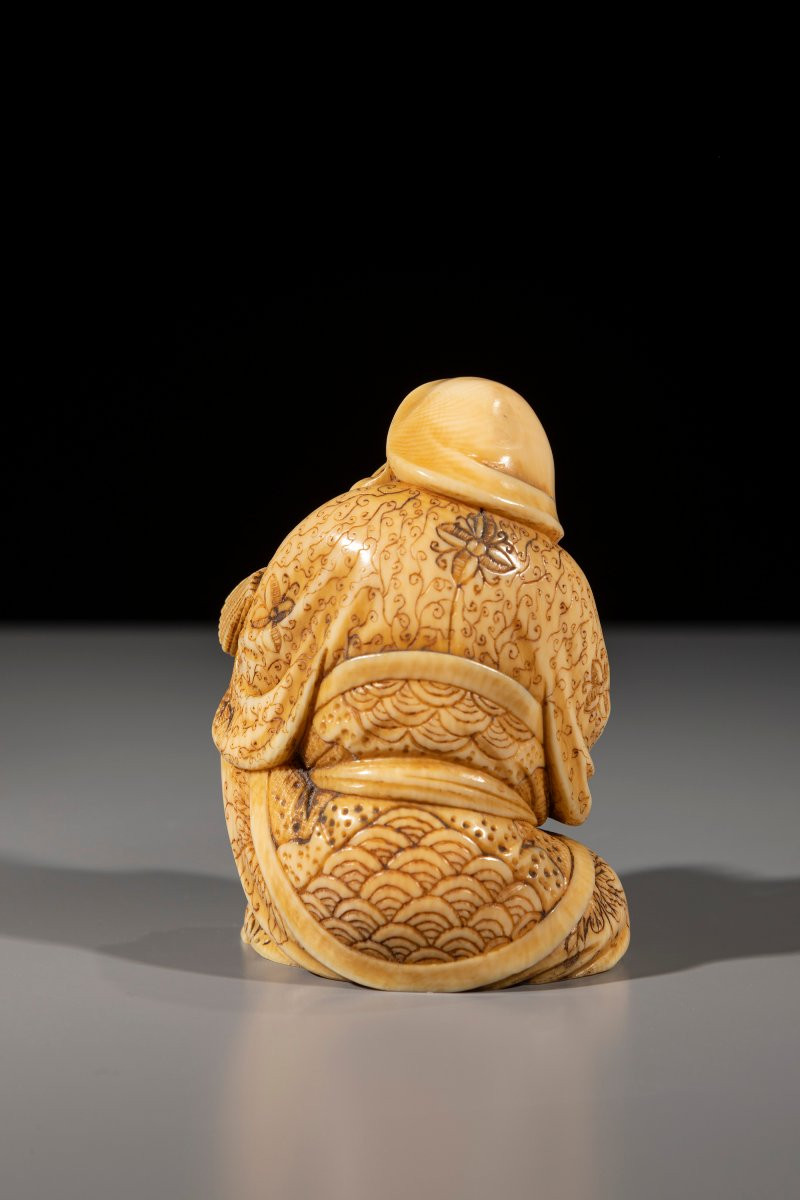 An Ivory Okimono Of Daikoku With Brush And Book-photo-4
