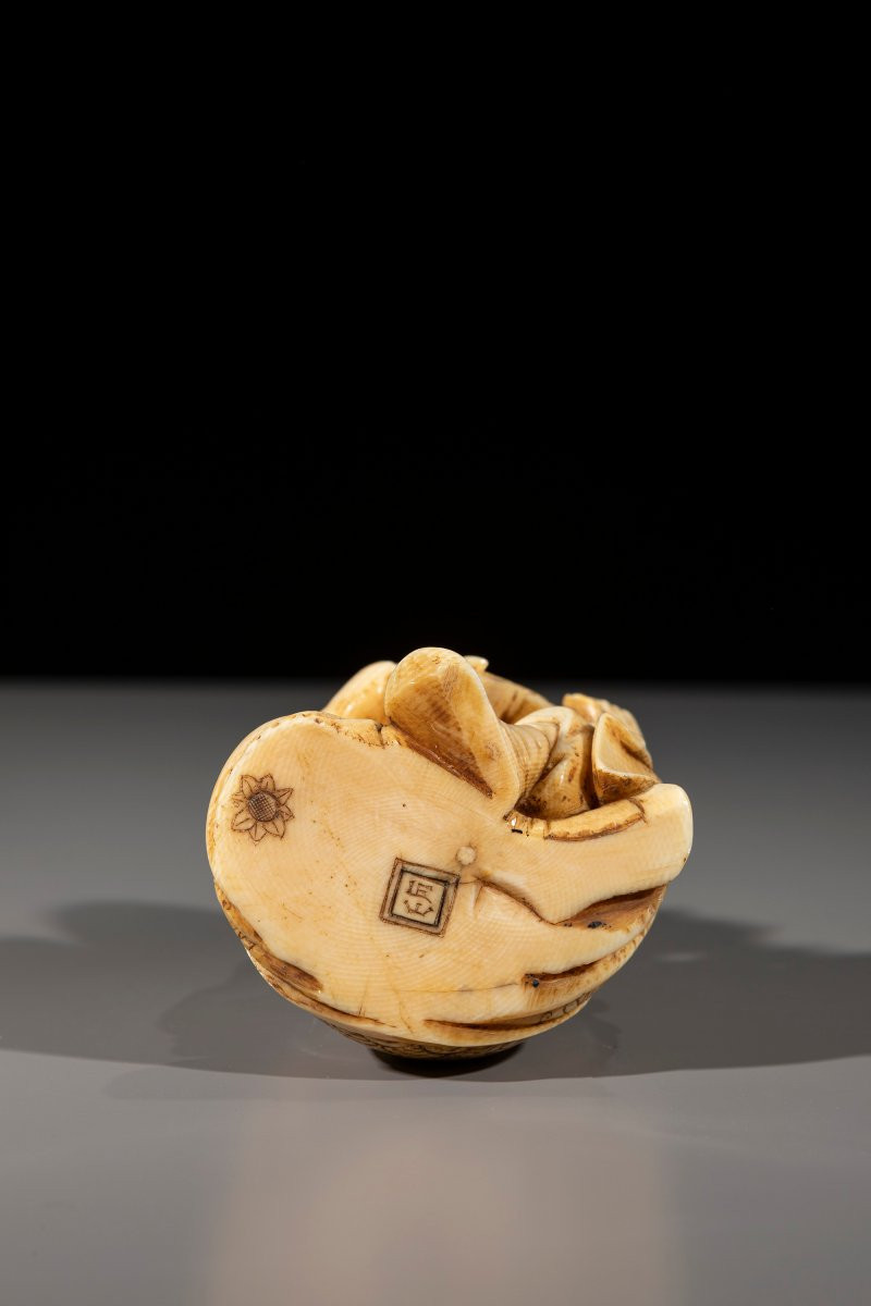 An Ivory Okimono Of Daikoku With Brush And Book-photo-2