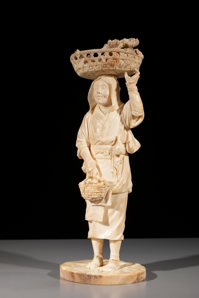 An Ivory Okimono Of The Tokyo School Depicting A Peasant Woman