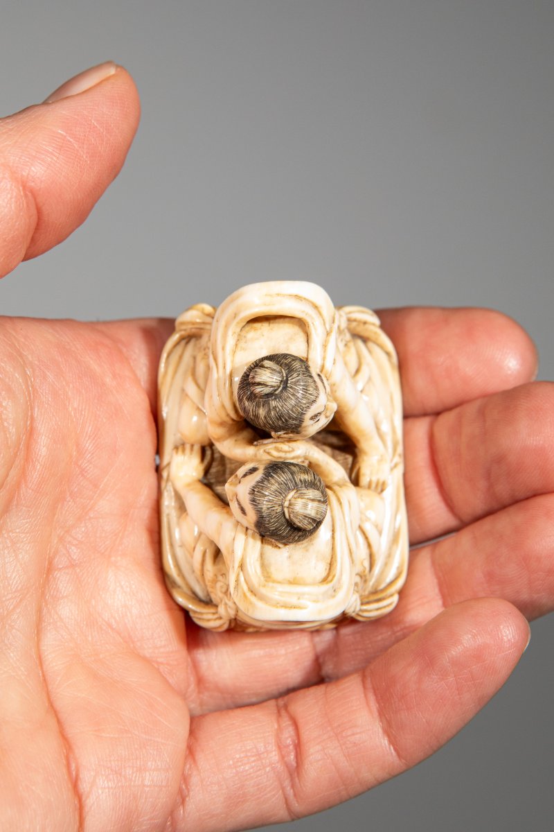 An Ivory Netsuke Depicting Raijin And Fujin On A Sandal-photo-1