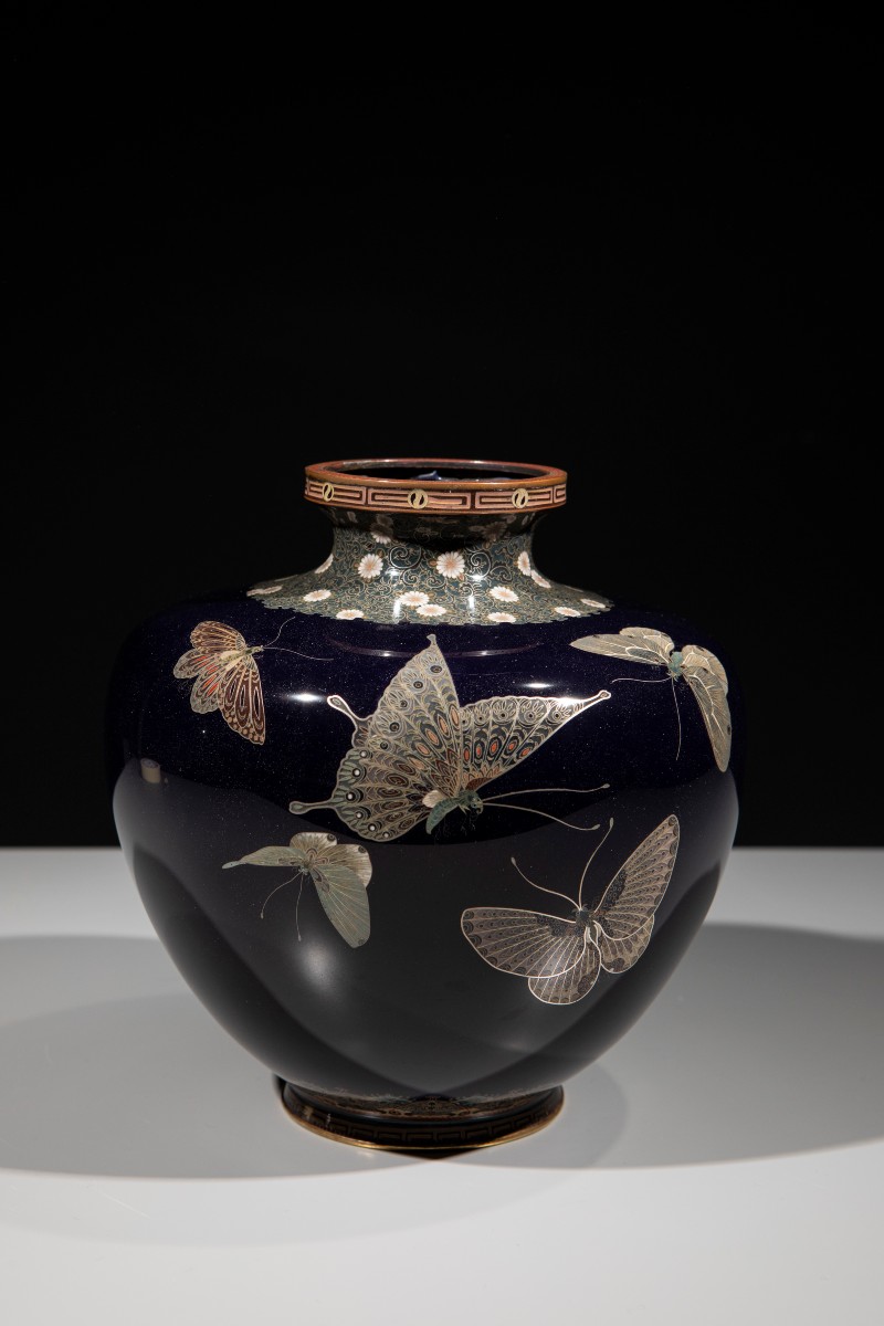 A Cloisonné Enamel And Silver Wire Vase With Butterflies On A Blue Ground