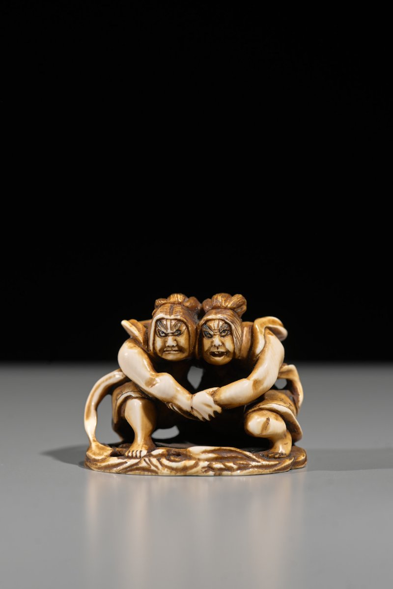 An Ivory Netsuke Depicting Raijin And Fujin