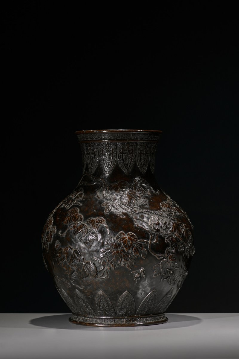 A Patinated Bronze Vase With Grapevines And Insects In Relief, Signed Sessei