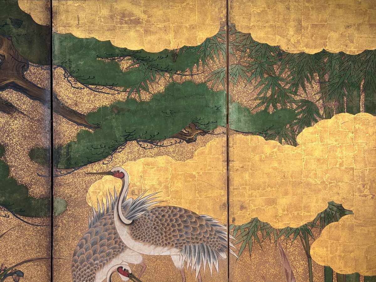 A Six-panel Gold Leaf Screen With Cranes Beneath A Majestic Pine-photo-1