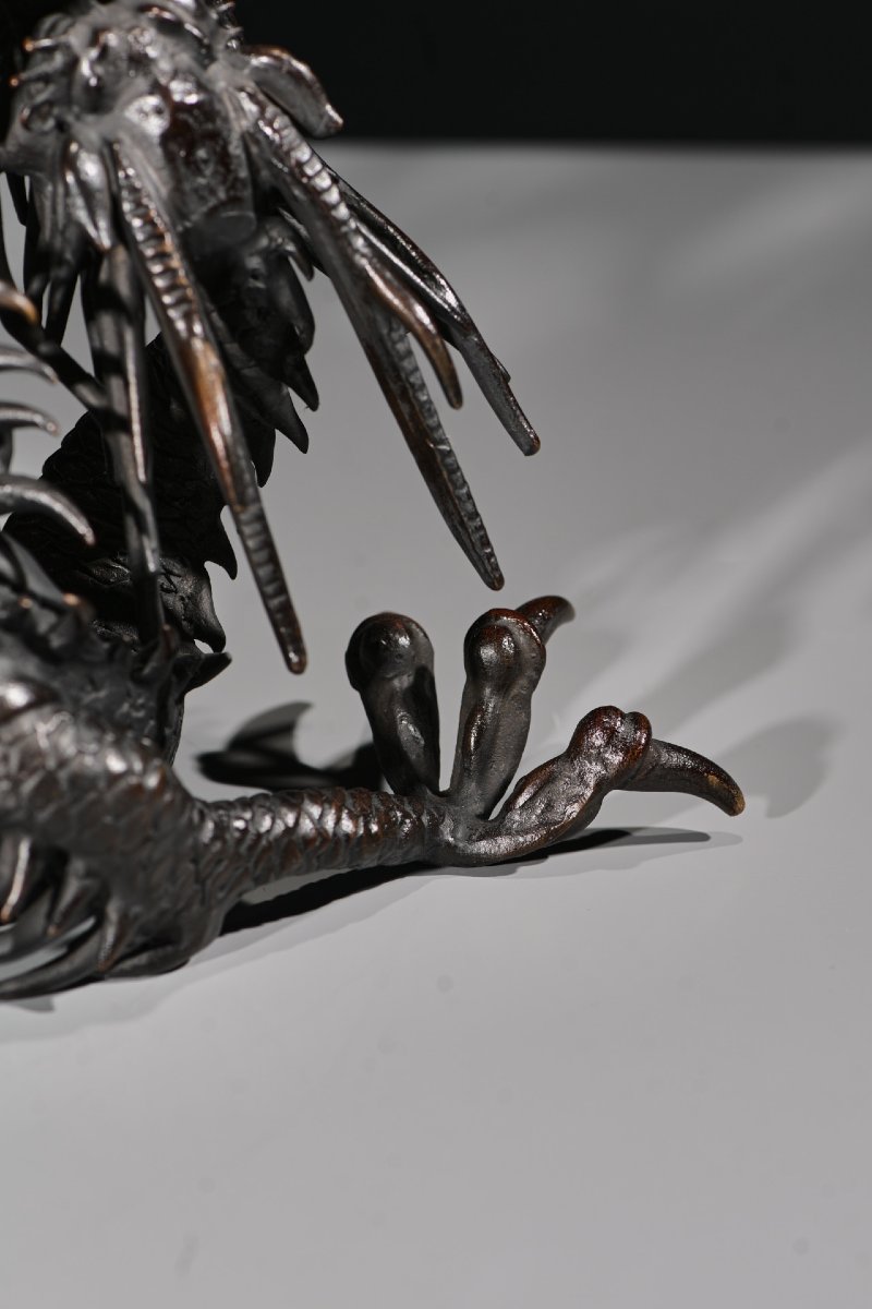 A Bronze Sculpture Of A Ryū Dragon With Sacred Jewel-photo-1