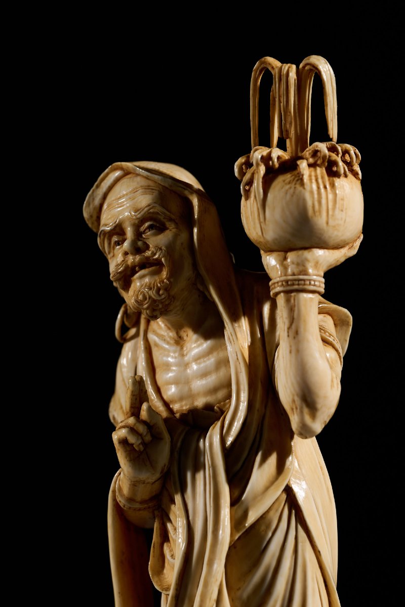 An Ivory Okimono Of A Rakan Holding A Ritual Vase, Signed Kazutoshi-photo-4