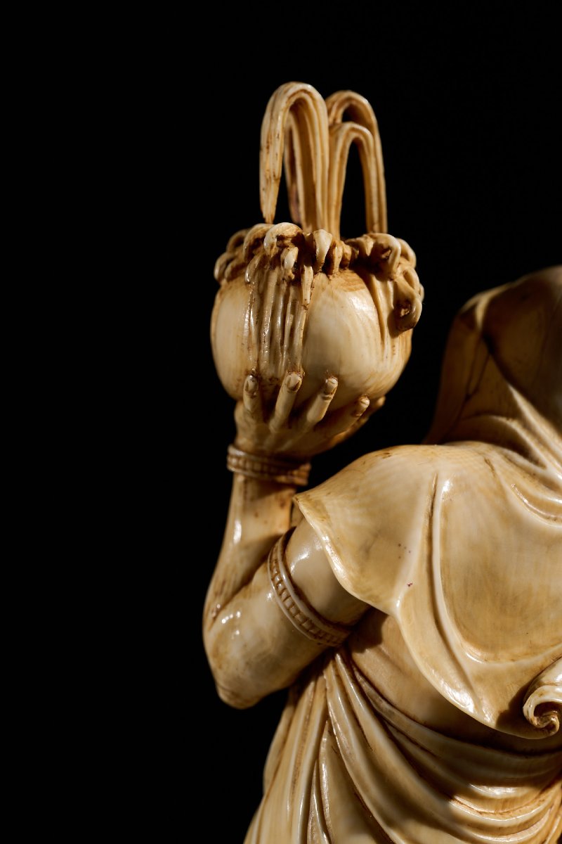 An Ivory Okimono Of A Rakan Holding A Ritual Vase, Signed Kazutoshi-photo-3