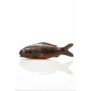 A Japanese Boxwood Okimono Depicting A Koi Carp