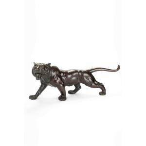 A Bronze Sculpture Depicting The Study Of A Roaring Tiger