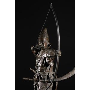 Okimono en bronze représentant un samouraï archer, signé Yoshimitsu
