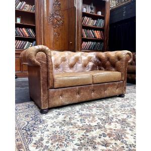 Canapé Chesterfield 2 places en cuir capitonné