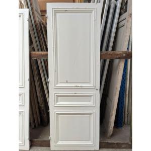 Antique Door With White-painted Wooden Moldings