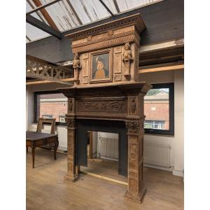 A Large Renaissance-style Fireplace Made Of Carved Oak, With A Mantelpiece