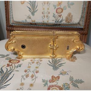 A Gilded Bronze Lock Case In The Louis XV Style, Signed By The Famous Sterling Paris Company