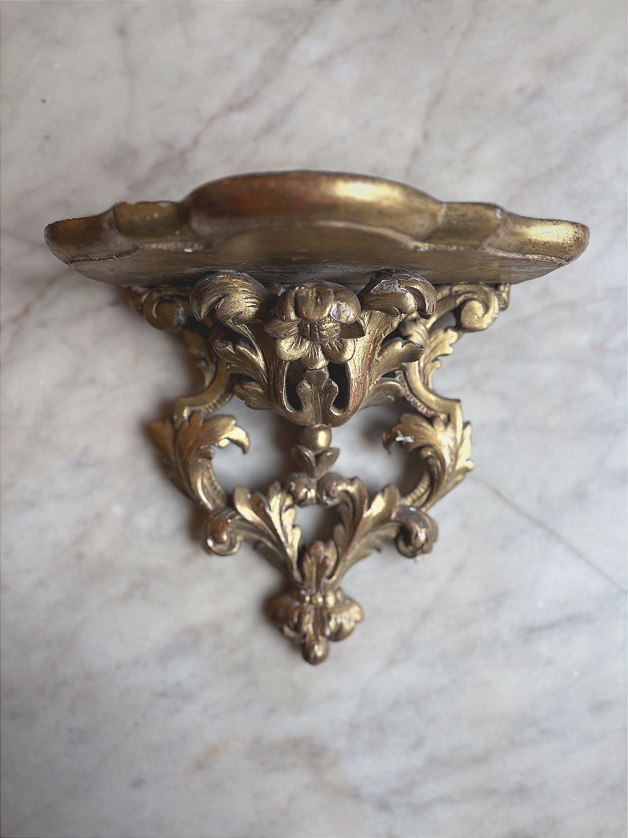 Console d’applique en bois doré 