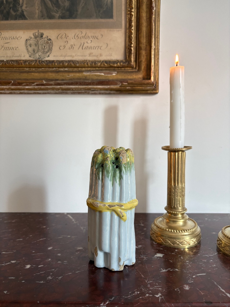 A Brussels Earthenware Shaker In The Shape Of A Bunch Of Asparagus