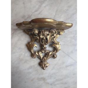 Console d’applique en bois doré 