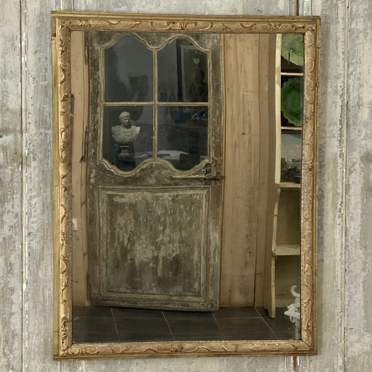 Miroir de boiserie en bois doré XVIII