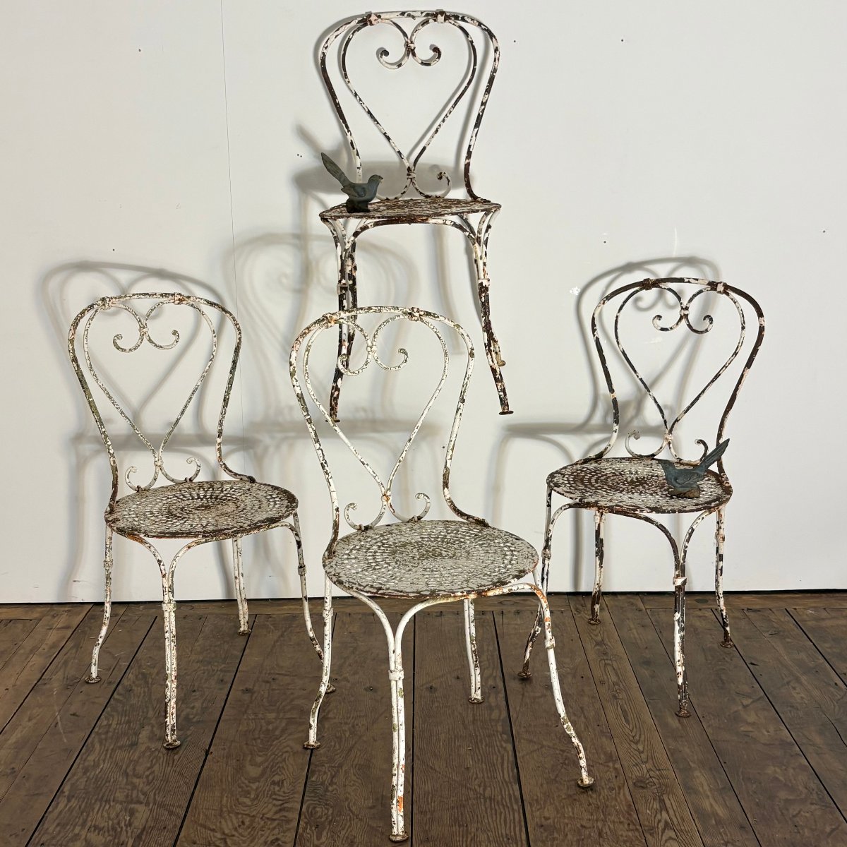 4 chaises de jardin en fer forgé riveté